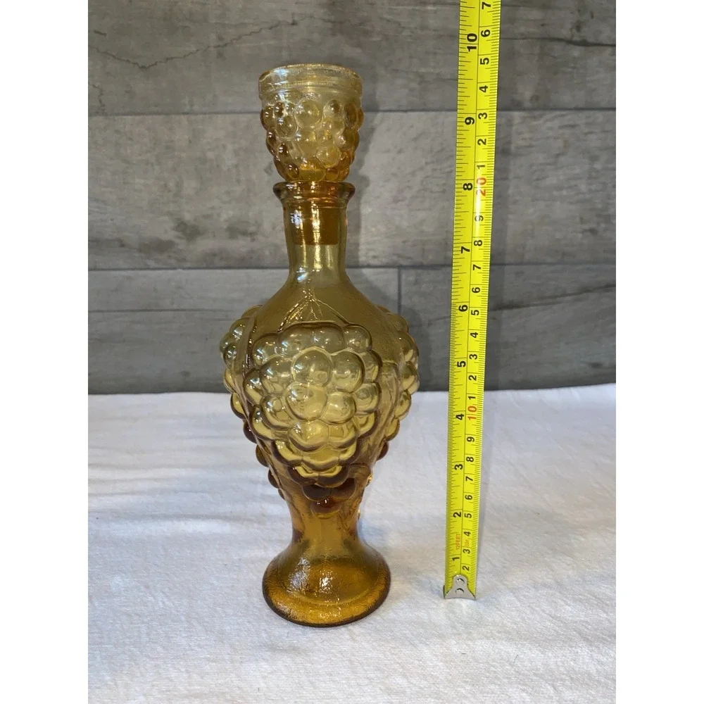 Vintage Amber Glass Decanter with matching stopper in‎ grape pattern